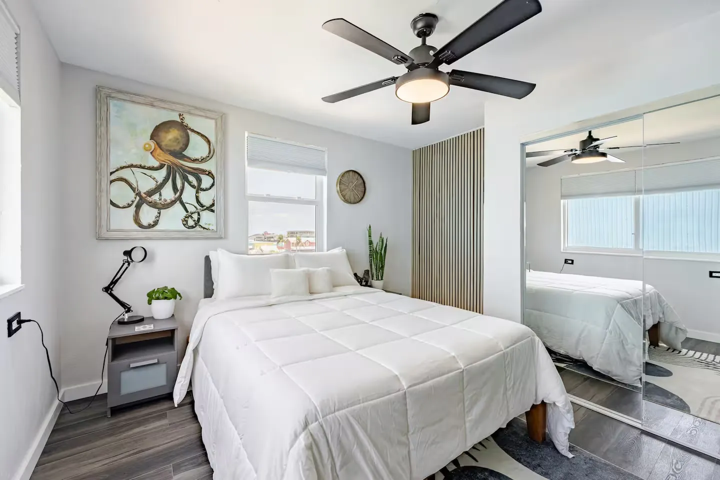 Octopus Loft bedroom with a queen bed and octopus artwork